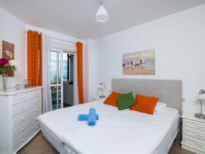 Cama o camas de una habitación en Apartment El Faro by Interhome