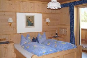 Postel nebo postele na pokoji v ubytování Ferienwohnung - Schmirnerhof