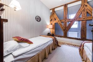 Posteľ alebo postele v izbe v ubytovaní Hotel St. Bruno