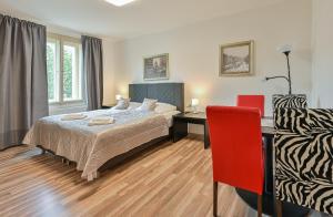 Posteľ alebo postele v izbe v ubytovaní Rabie Aparthotel