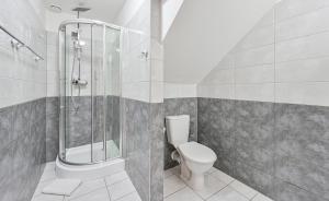 Kúpeľňa v ubytovaní Rabie Aparthotel