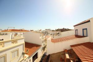 an aerial view of a city with white buildings at A Casa Lagos, City in Lagos