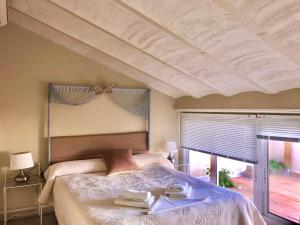 Кровать или кровати в номере Hotel Finca Aldabra