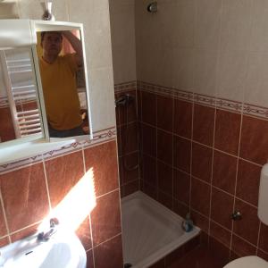 Kúpeľňa v ubytovaní Dávid Apartman