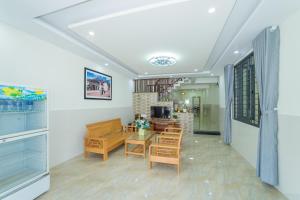 TV a/nebo společenská místnost v ubytování Coco Village Homestay Hoi An