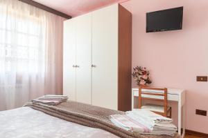 Postel nebo postele na pokoji v ubytování B&B Il Mirto