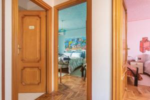 Postel nebo postele na pokoji v ubytování B&B Il Mirto