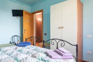 Postel nebo postele na pokoji v ubytování B&B Il Mirto