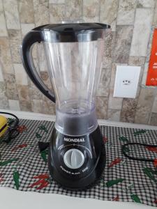 a blender sitting on top of a counter at Pousada Beach Eco House Floripa Com Ar Condicionado in Florianópolis