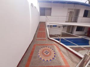 a view from the top of a building with a tile floor at Villa Mary Hostal in Barranquilla