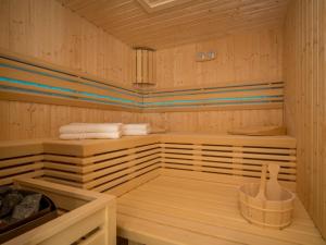 a sauna with two beds and towels in it at Holiday Home Anđela by Interhome in Dobrinj