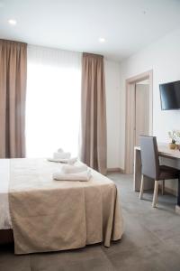 Postel nebo postele na pokoji v ubytování Hotel Solemare - Frontemare - 3 Stelle Superior