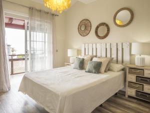 Voodi või voodid majutusasutuse Holiday Home Capitana by Interhome toas