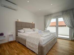 Postel nebo postele na pokoji v ubytování Holiday Home Anđela by Interhome