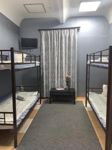 
A bunk bed or bunk beds in a room at Hostel on Talsinskaya
