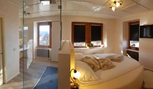 Postel nebo postele na pokoji v ubytování Villa Ciardi Wellness Hotel & Ristorante