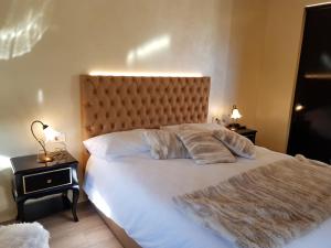 Postel nebo postele na pokoji v ubytování Villa Ciardi Wellness Hotel & Ristorante