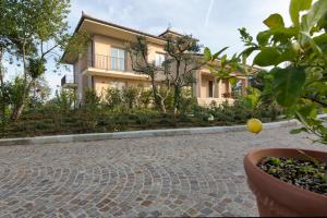 Vonkajšia záhrada v ubytovaní Luxury Villa Spaccasole su Cortona - Sauna & Infinity Pool