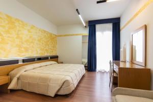 Postel nebo postele na pokoji v ubytování Park Hotel