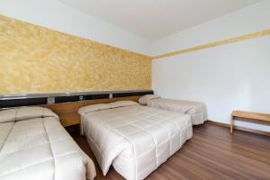 Postel nebo postele na pokoji v ubytování Park Hotel