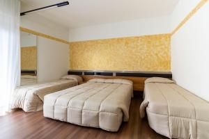 Postel nebo postele na pokoji v ubytování Park Hotel
