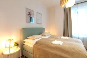 Elegant Apartment Vienna 객실 침대