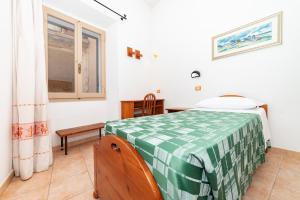 Postel nebo postele na pokoji v ubytování San Francesco Heritage Hotel + 27 fotografií