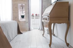 Voodi või voodid majutusasutuse Petrantiche - Albergo Diffuso toas