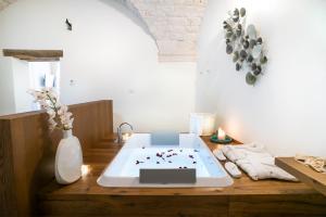 Voodi või voodid majutusasutuse Petrantiche - Albergo Diffuso toas