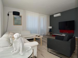 Telewizja i/lub zestaw kina domowego w obiekcie Luxe Penthouse Casa Atlantica Morro Jable Sea Views By PVL