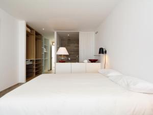 Łóżko lub łóżka w pokoju w obiekcie Luxe Penthouse Casa Atlantica Morro Jable Sea Views By PVL