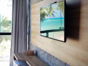 TV i/ili multimedijalni sistem u objektu Vila de Taipa Exclusive Hotel