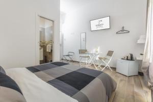 Postel nebo postele na pokoji v ubytování Scirocco Rooms