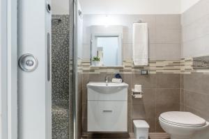 Koupelna v ubytování Scirocco Rooms