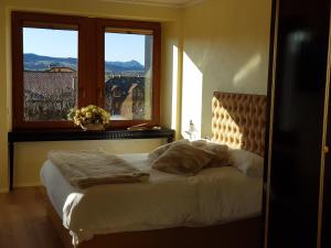 Postel nebo postele na pokoji v ubytování Villa Ciardi Wellness Hotel & Ristorante