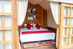 Krevet ili kreveti u jedinici u objektu Birdglamping Los Arboles Glamping Hotel