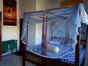 Letto o letti in una camera di Main Reef Guest House