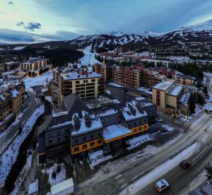 a city with a lot of buildings and mountains at Gravity Haus in Breckenridge