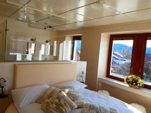 Postel nebo postele na pokoji v ubytování Villa Ciardi Wellness Hotel & Ristorante