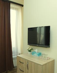 TV a/nebo společenská místnost v ubytování Guest House MARGARYAN