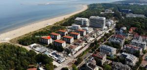 an aerial view of a city and the beach at Apartament Baltic Park Plaża 1.1.1 in Świnoujście