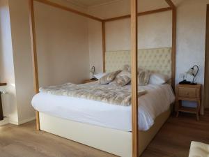 Postel nebo postele na pokoji v ubytování Villa Ciardi Wellness Hotel & Ristorante