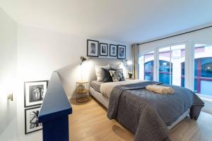 Ένα ή περισσότερα κρεβάτια σε δωμάτιο στο Architect's Duplex - Haut Marais