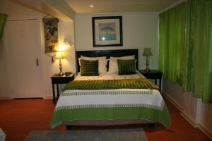 Ένα ή περισσότερα κρεβάτια σε δωμάτιο στο Ocean Dreams B&B