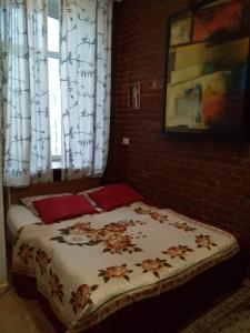 Кровать или кровати в номере Gostevoy Dom na Suhkharevke