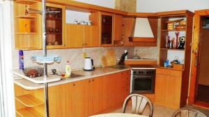 Кухня или мини-кухня в Villa Federer
