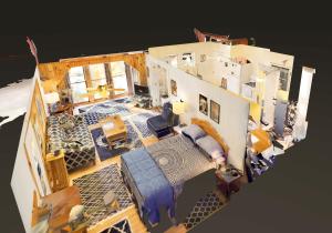 an aerial view of a living room of a house at Cavalier Cottage B&B in Shelburne Falls