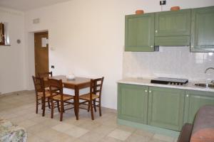 Kuchyň nebo kuchyňský kout v ubytování Agriturismo La Selva