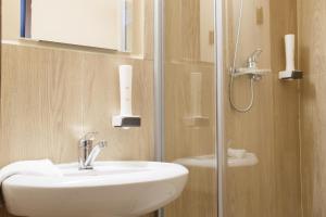 Ванная комната в Casa de Piatra Bistro