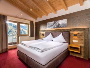 Ένα ή περισσότερα κρεβάτια σε δωμάτιο στο LAUDEGGHOF Ladis